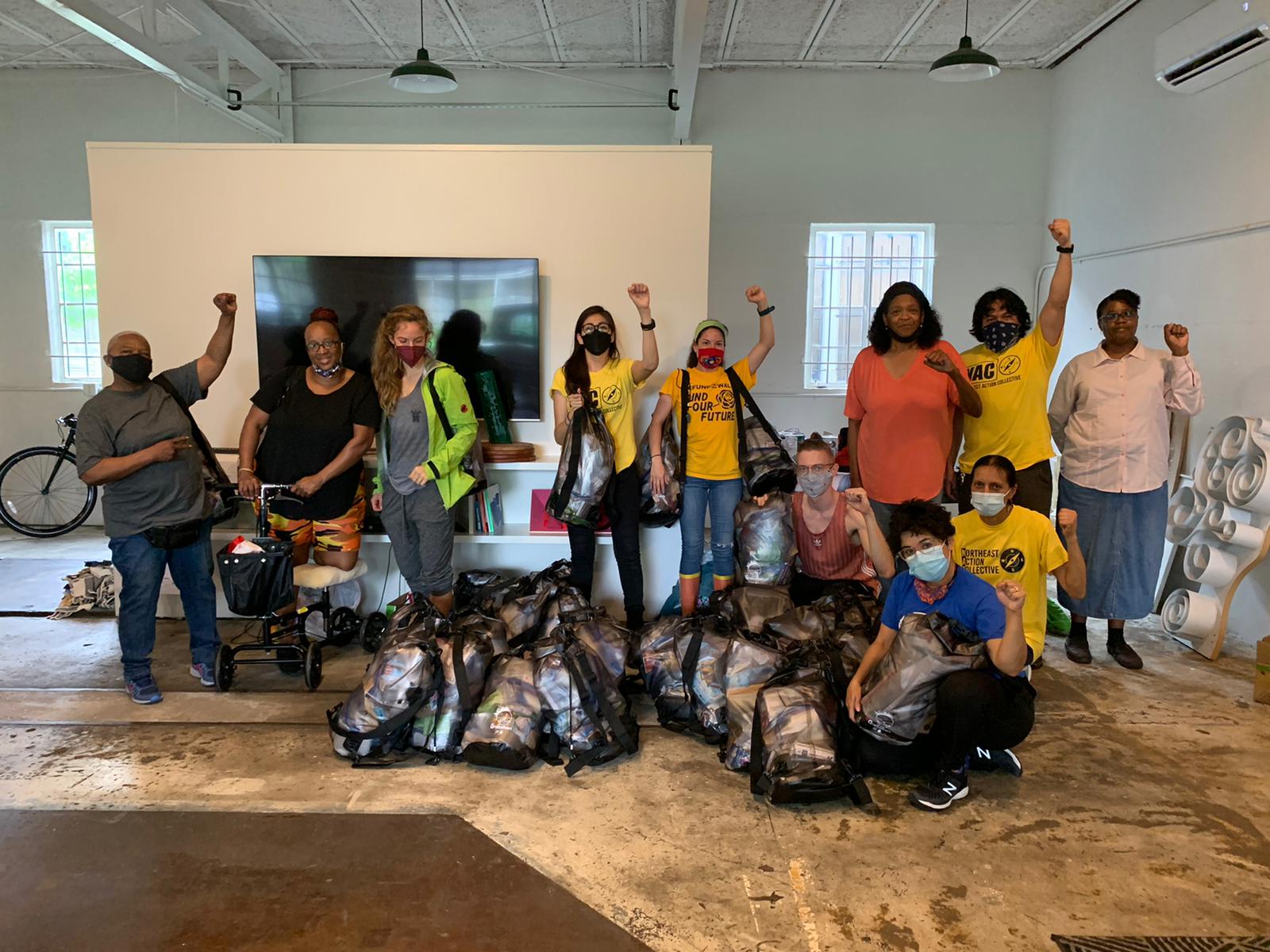 Northeast Action Collective and West Street Recovery created disaster preparedness bags f
or all NAC and Caucus
members to aid in the upcoming hurricane season and fears of blackouts during heat waves
and the ongoing pandemic. although we are working for systemic
change, we know disaster
is inevitable and frequent. (Photo Credit: WSR Staff)