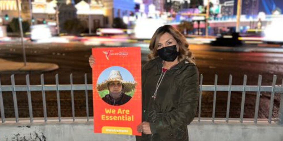 Make the Road Nevada and PLAN December 2022 vigil on the Las Vegas Strip supporting permanent protections for migrant workers and calling for US Congress to pass legislation for a pathway to citizenship during their “lame duck” session. Photo credit: Make the Road Nevada